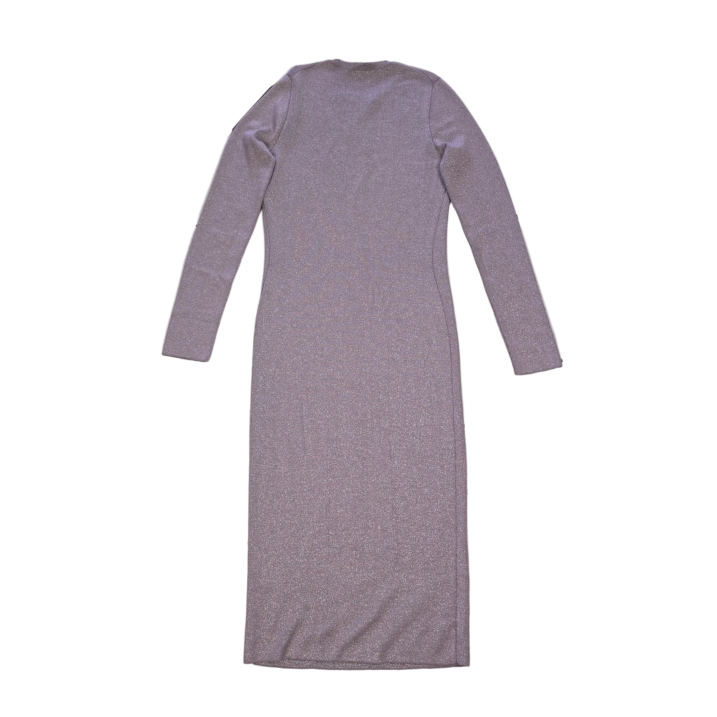 Plum coloured dress with silver details on a light background