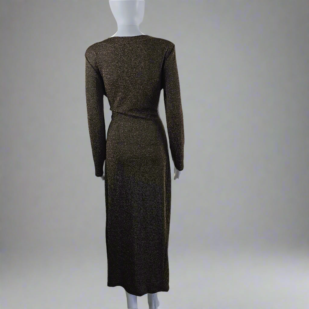 Black and gold textured dress on a mannequin against a light gray background