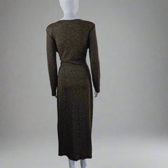 Black and gold textured dress on a mannequin against a light gray background