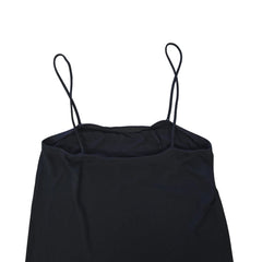 Black mini dress on a light background