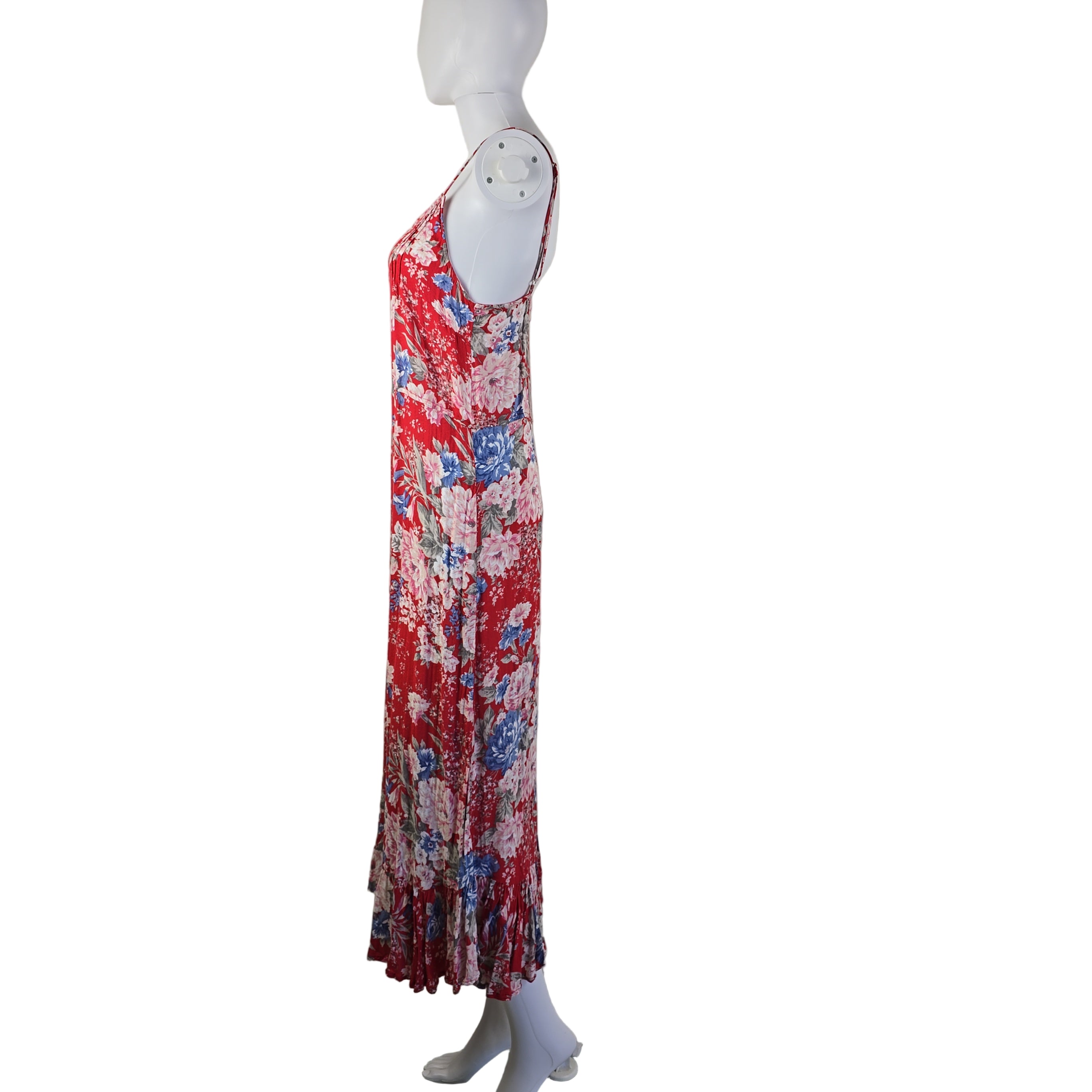 Floral dress on a mannequin against a white background