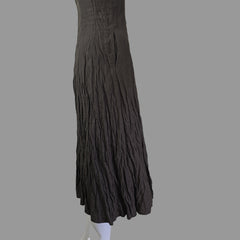 Black dress on a white surface