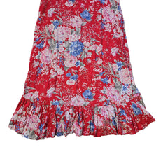 Red floral skirt on a tiled floor