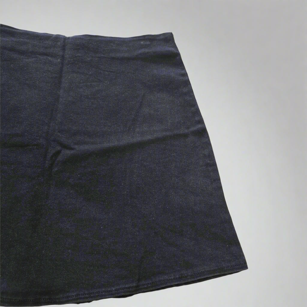 Dark blue fabric on a tiled floor