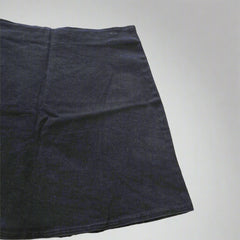 Dark blue fabric on a tiled floor