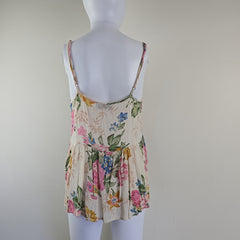 Cream floral top on a light background