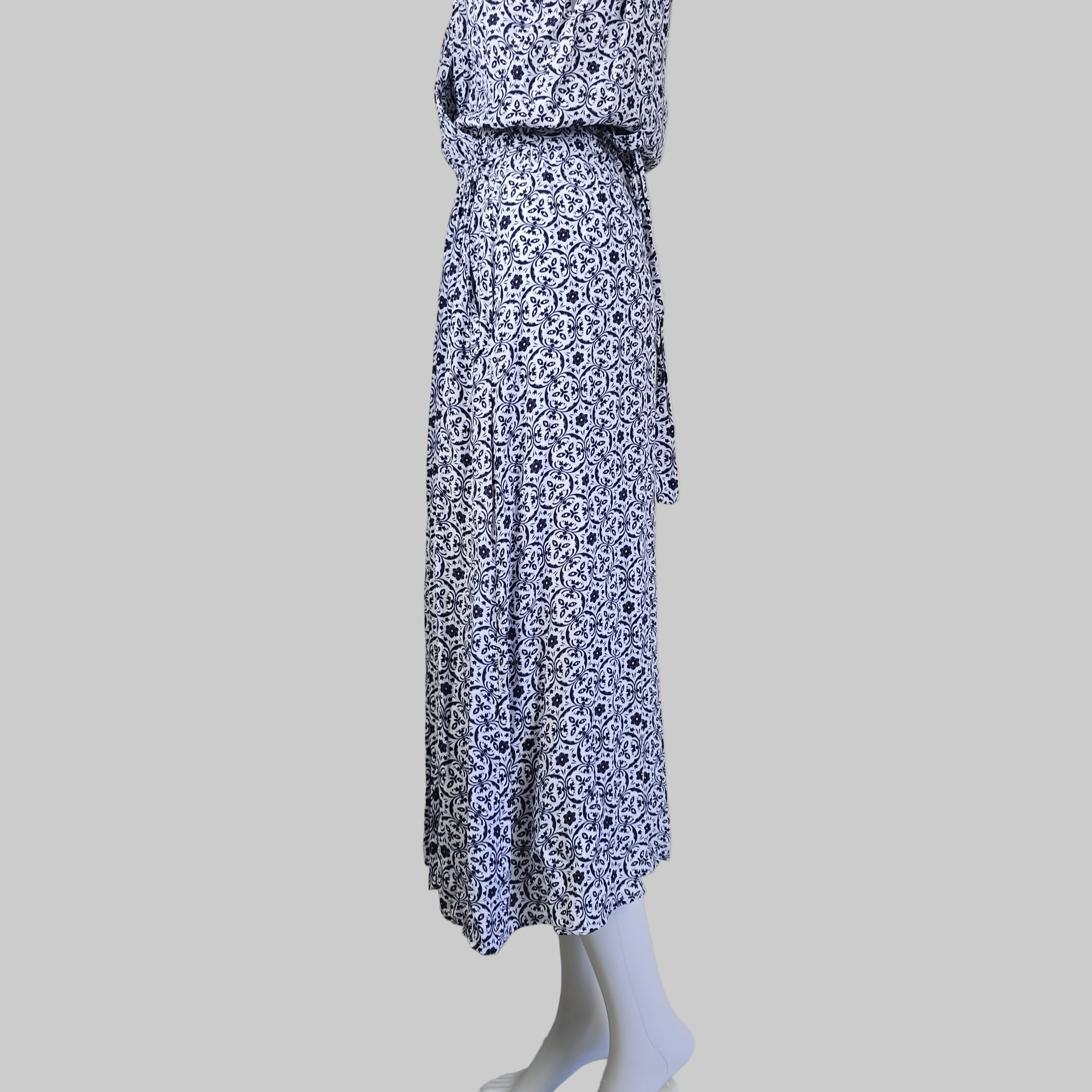 Blue and white dress on a white surface
