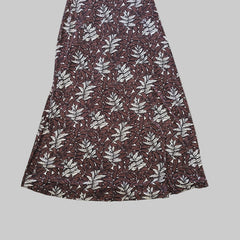 Patterned fabric on a tiled floor