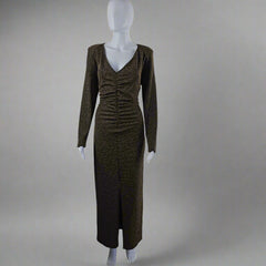 Black and gold textured dress on a mannequin against a light gray background
