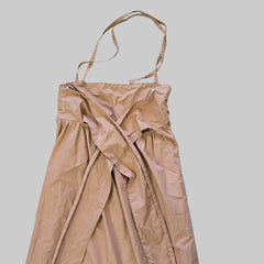 Brown dress on a tiled floor