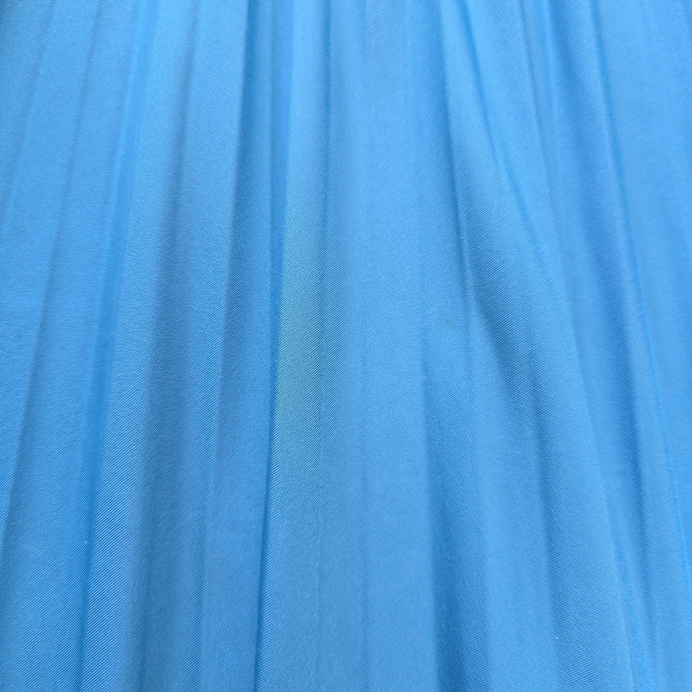Close-up of blue fabric with visible texture