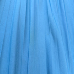 Close-up of blue fabric with visible texture
