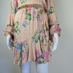 Floral-patterned fabric on a mannequin with a plain background