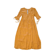 Yellow dress on a light background