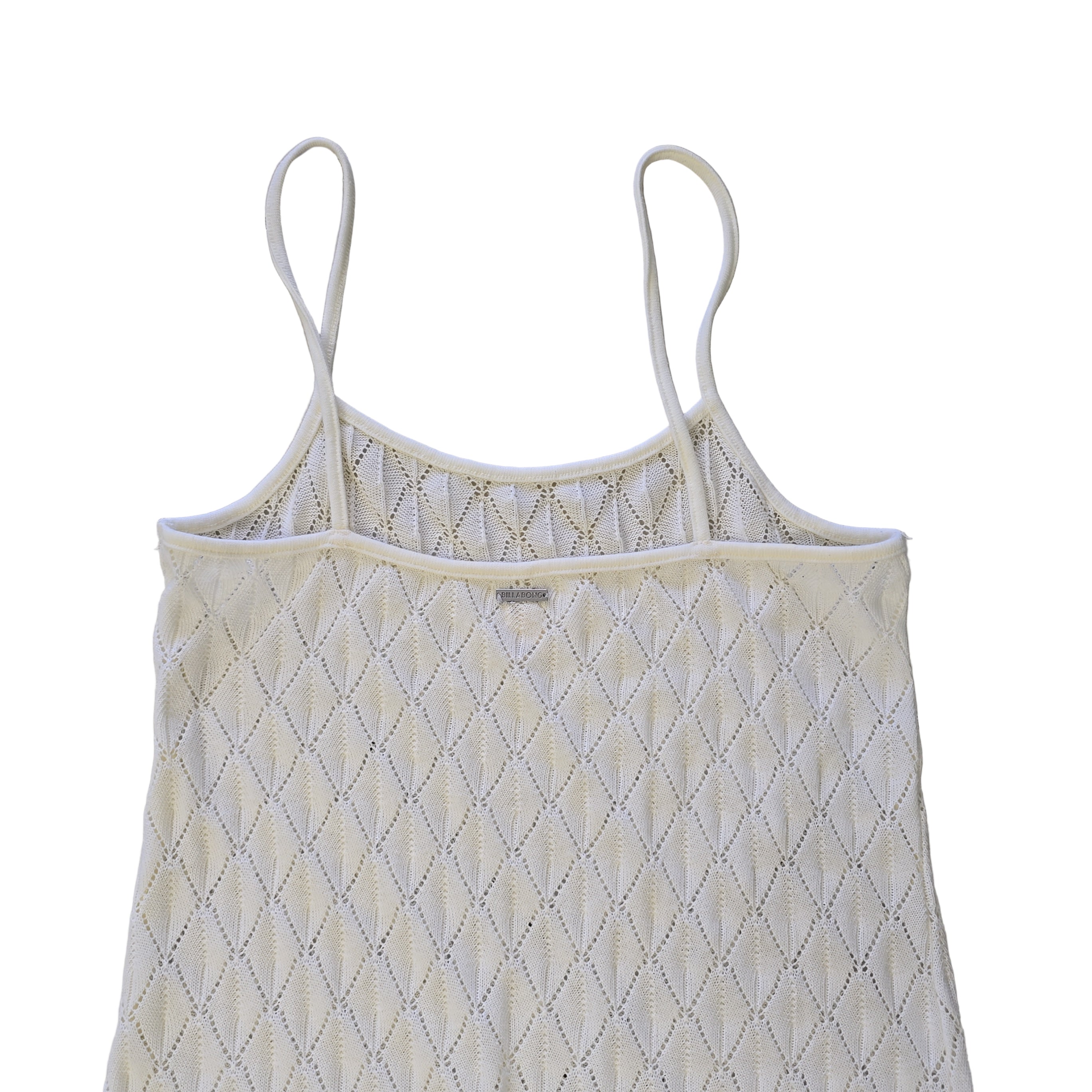 White textured dress on a light background.