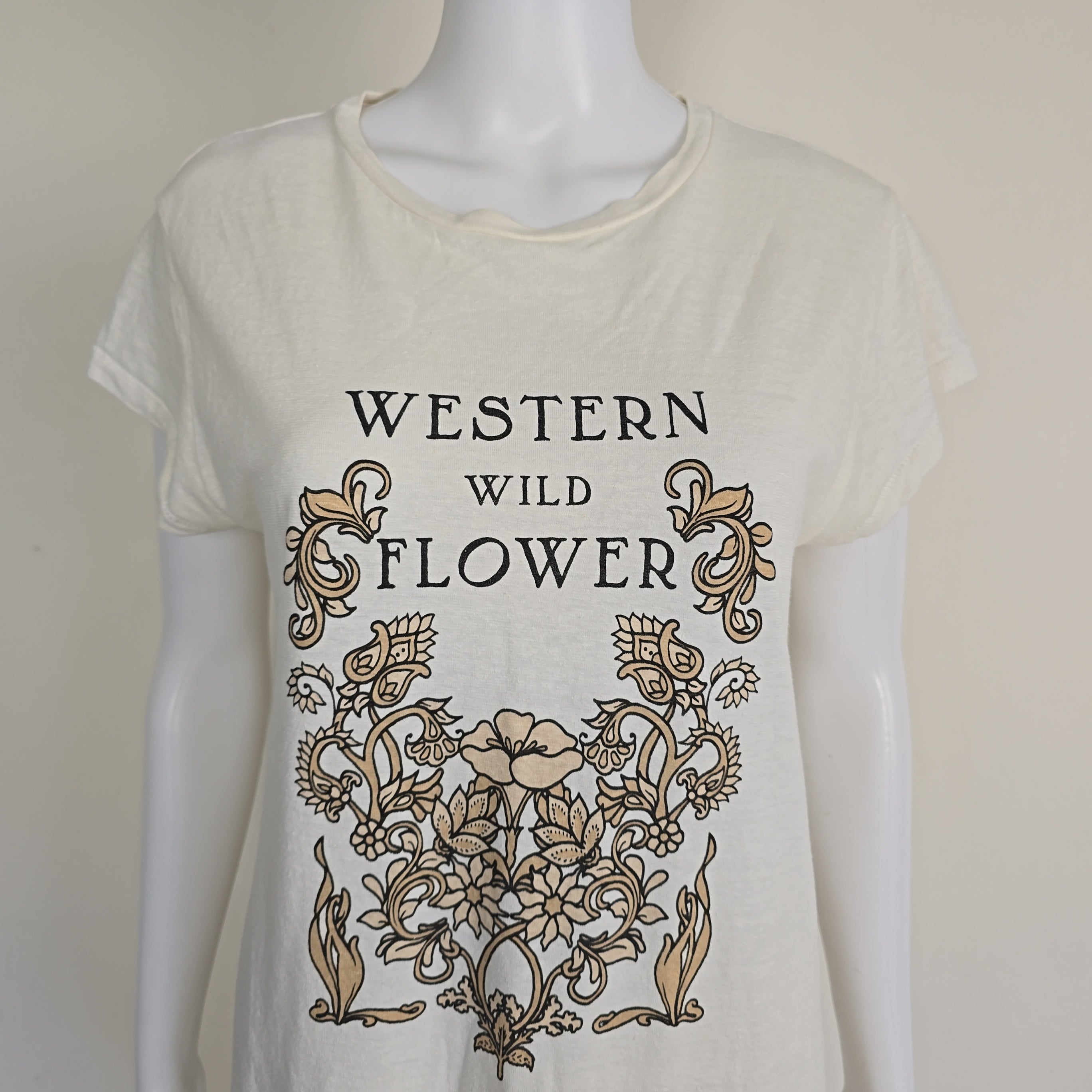White tank top with 'Western Wild Flower' design on a mannequin against a white background