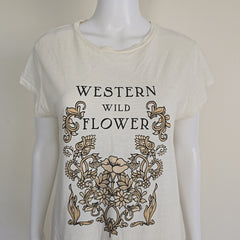 White tank top with 'Western Wild Flower' design on a mannequin against a white background