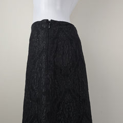 Black textured skirt on a white background