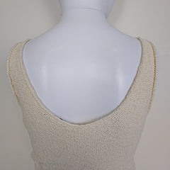 White knitted tank top on a light background