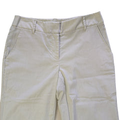 beige and white striped pants on a tiled floor