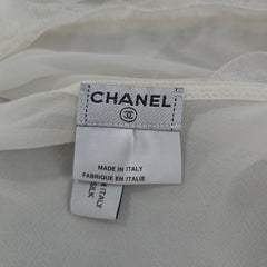 Chanel label on a silk fabric background
