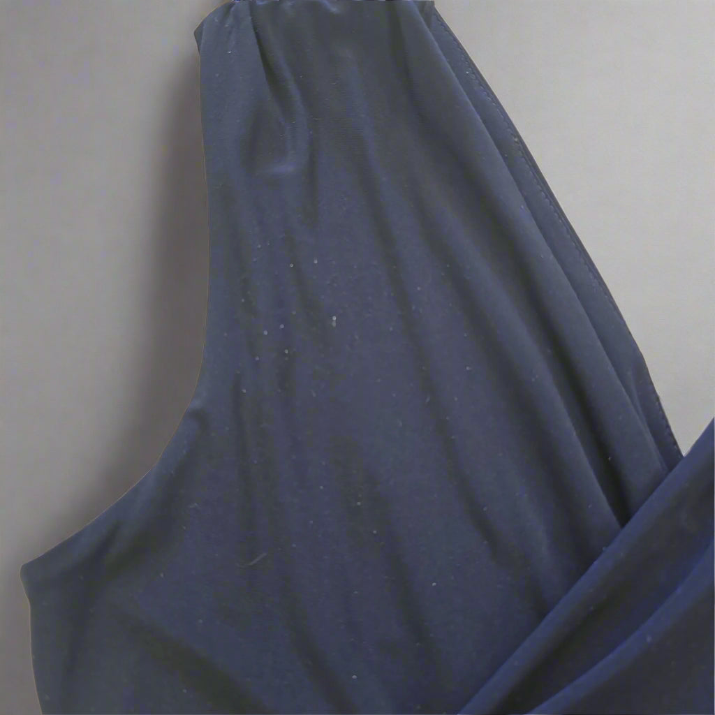 Close-up of blue fabric on a beige surface