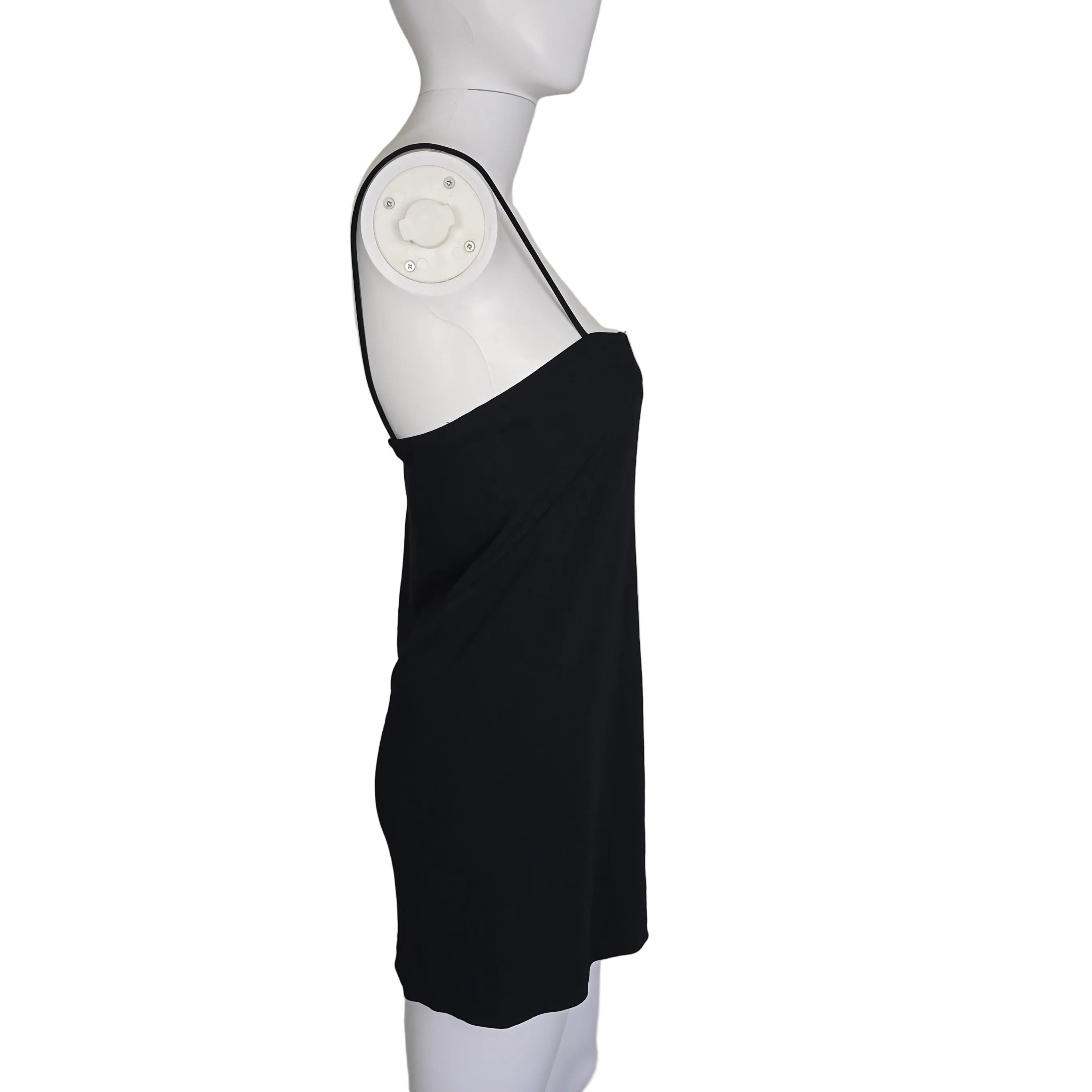 Black mini dress on a light background