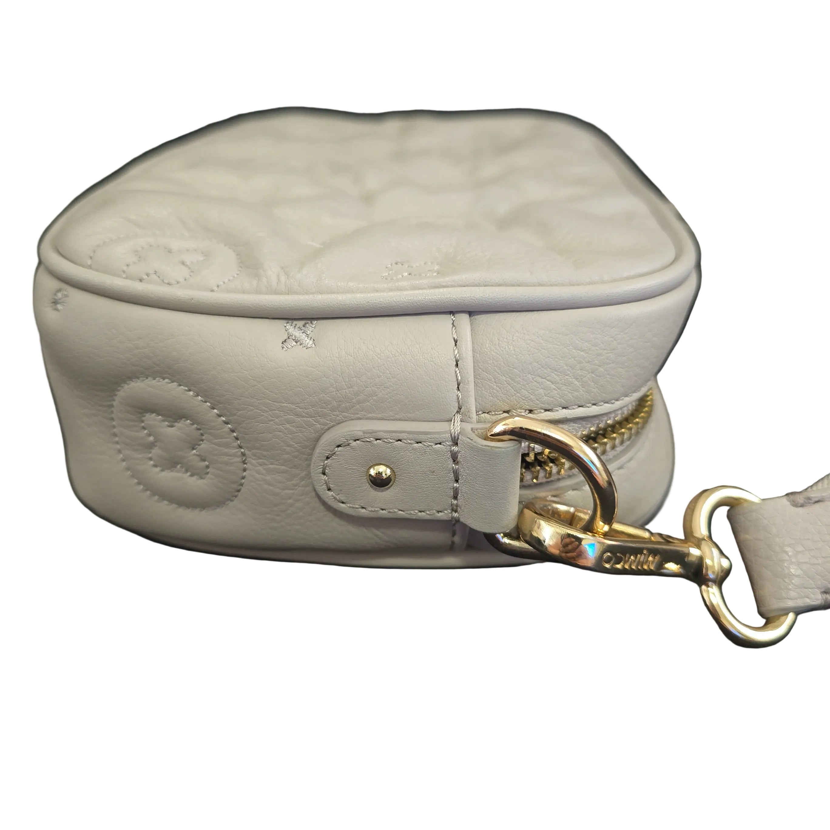 Light gray leather pouch with gold zipper on a light background