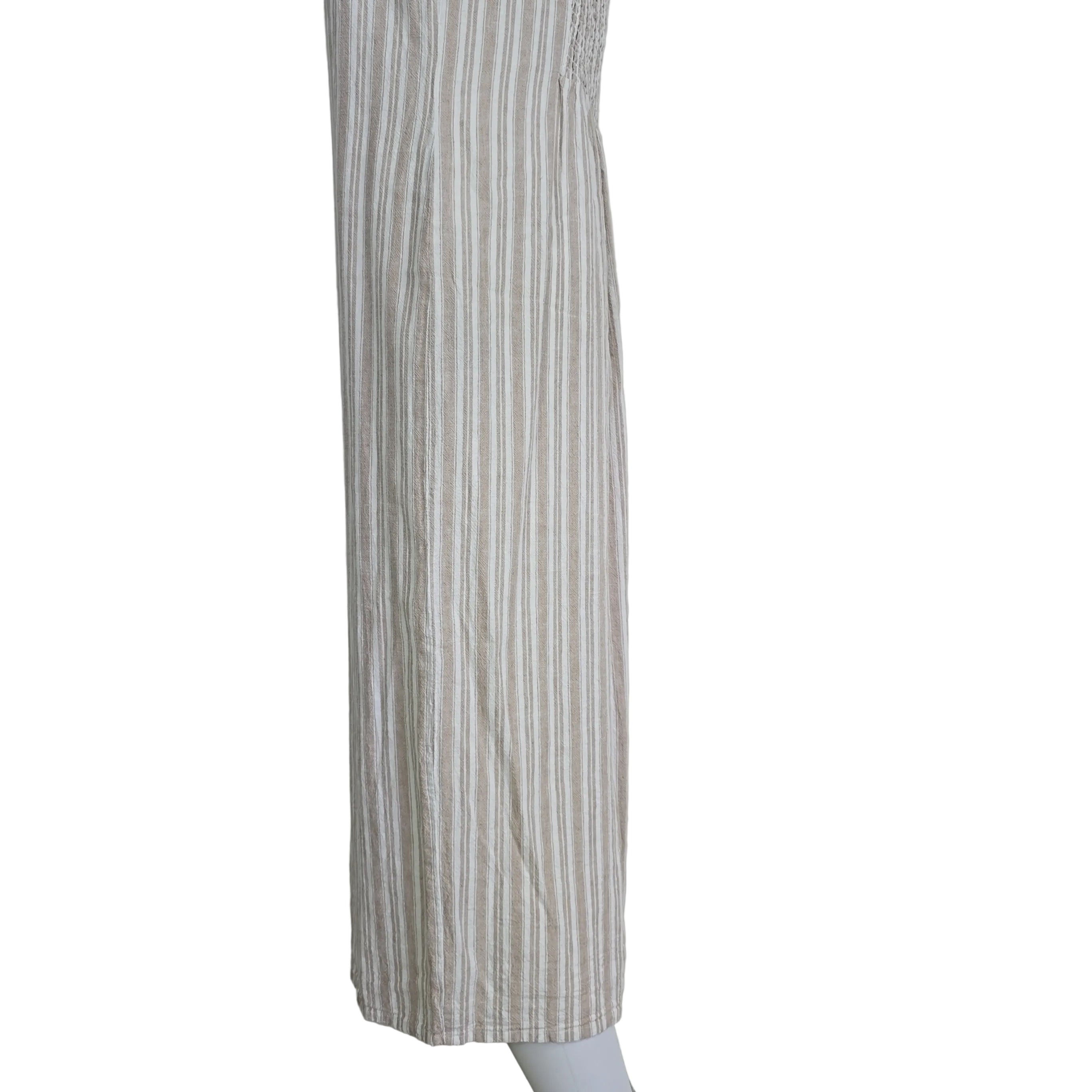 Striped dress with button details on a light background