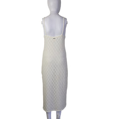 White textured dress on a light background.