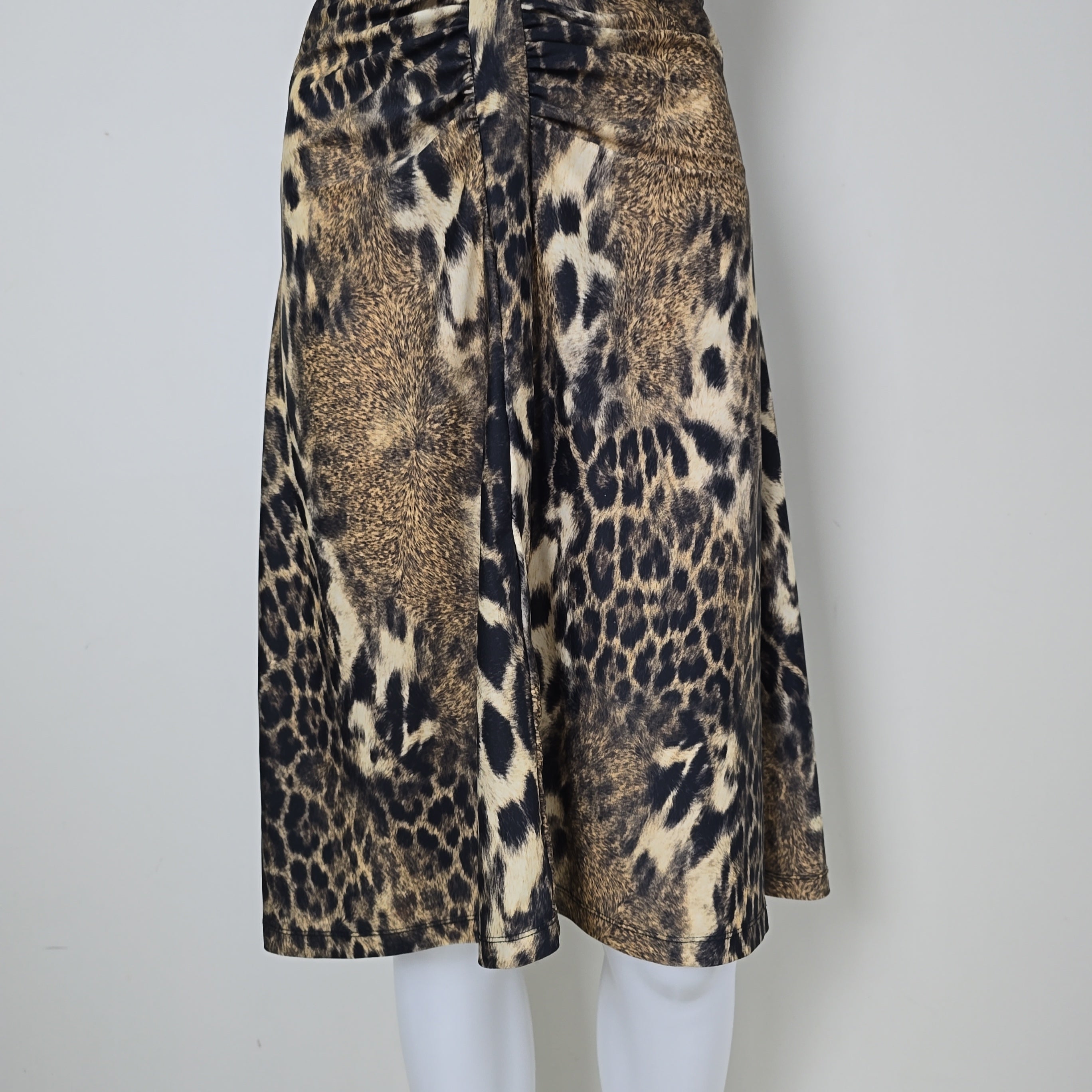 Leopard print dress on a light background