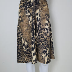 Leopard print dress on a light background