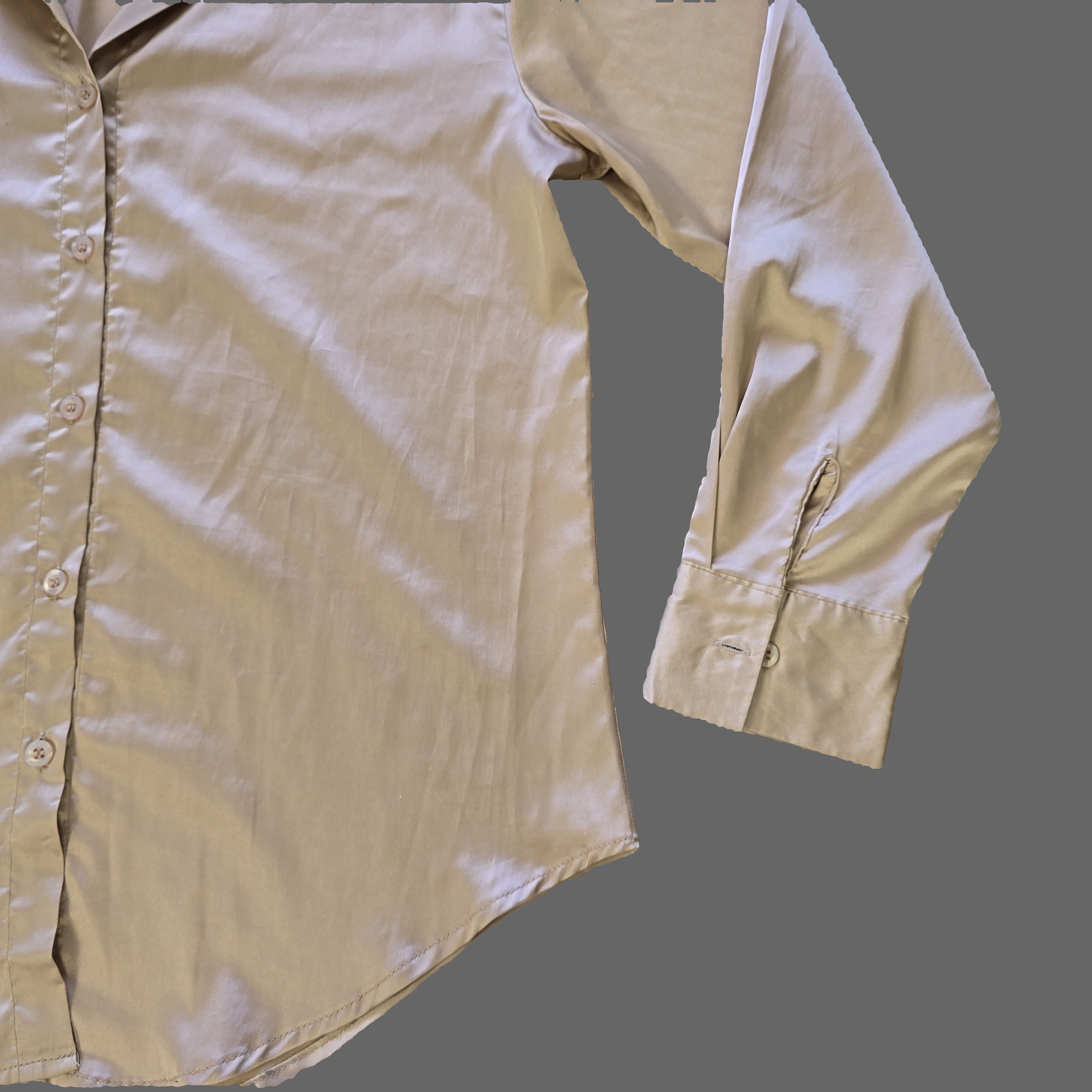 Beige shirt on a tiled floor