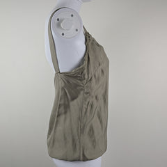 Grey garment on a white mannequin with a gray background