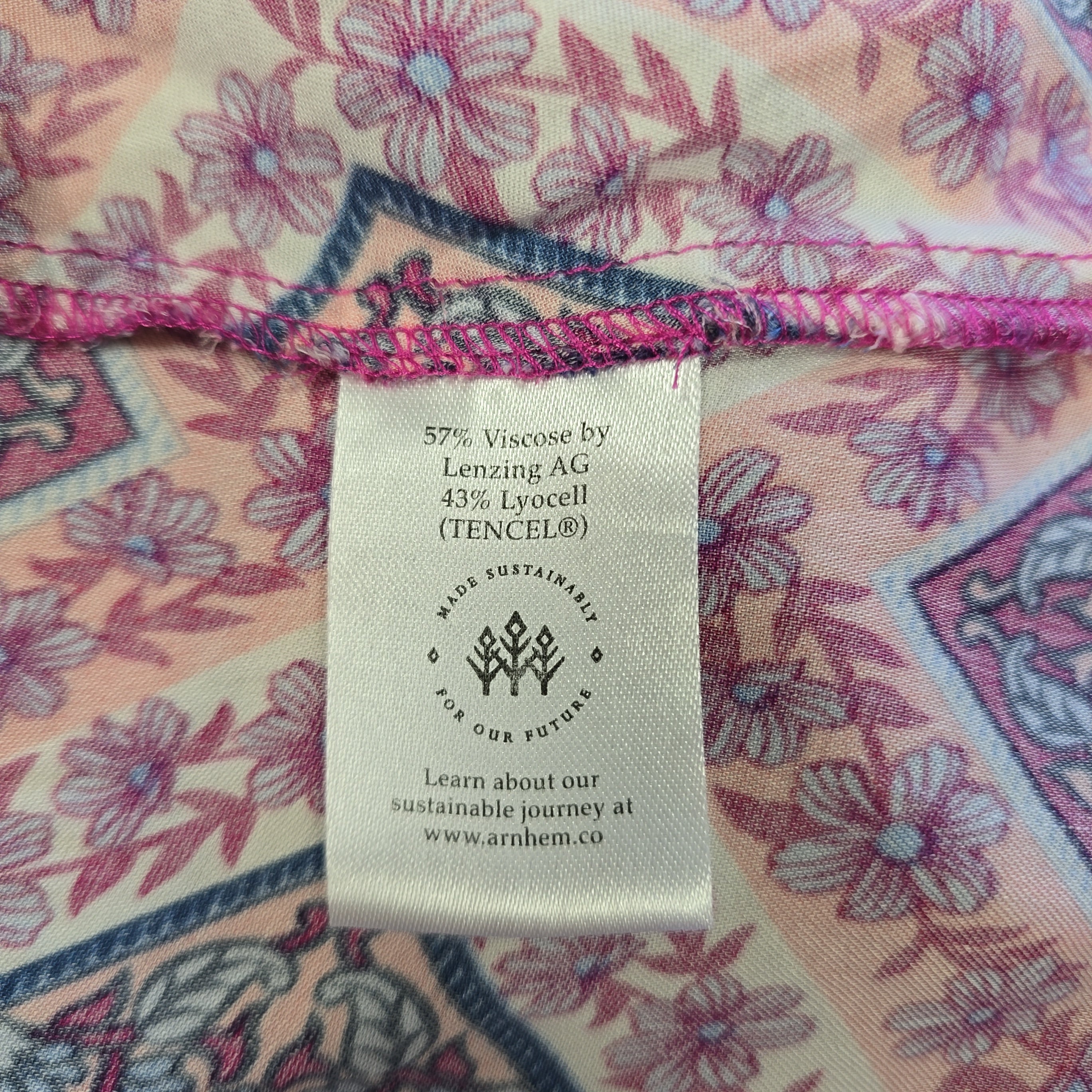 Fabric label with floral pattern on a piece of fabric