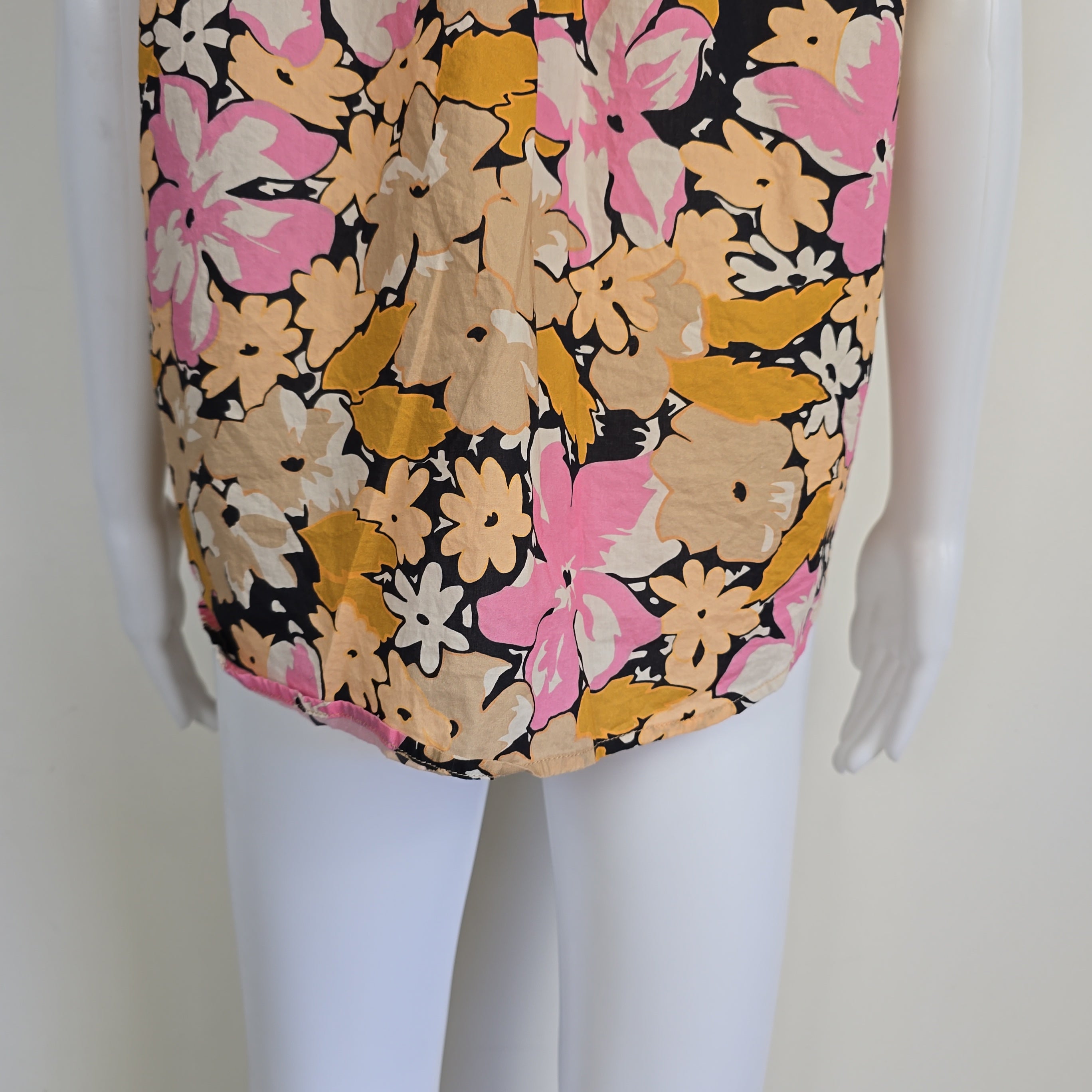 Floral-patterned product on a mannequin against a neutral background