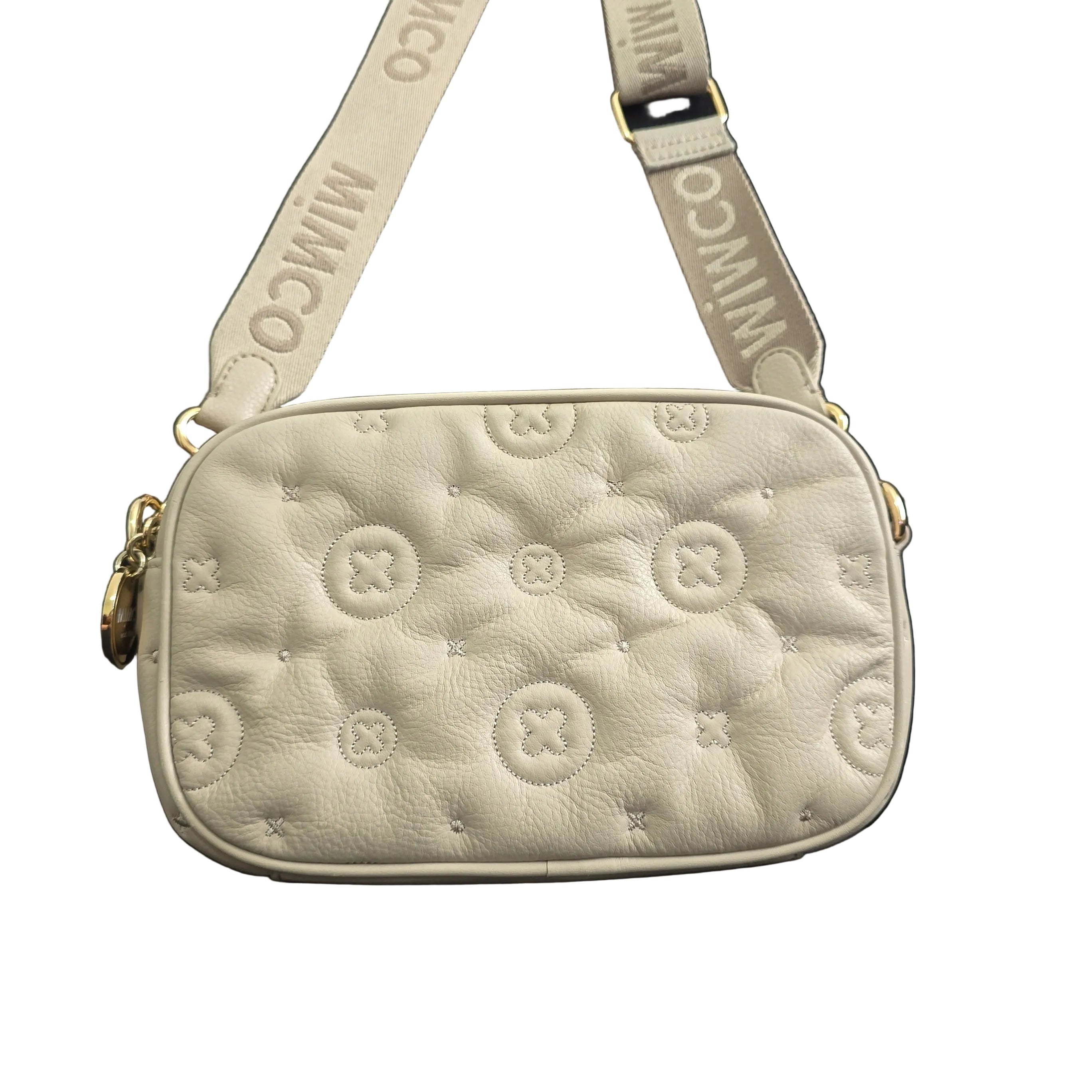 Grey shoulder bag with gold accents on a light background