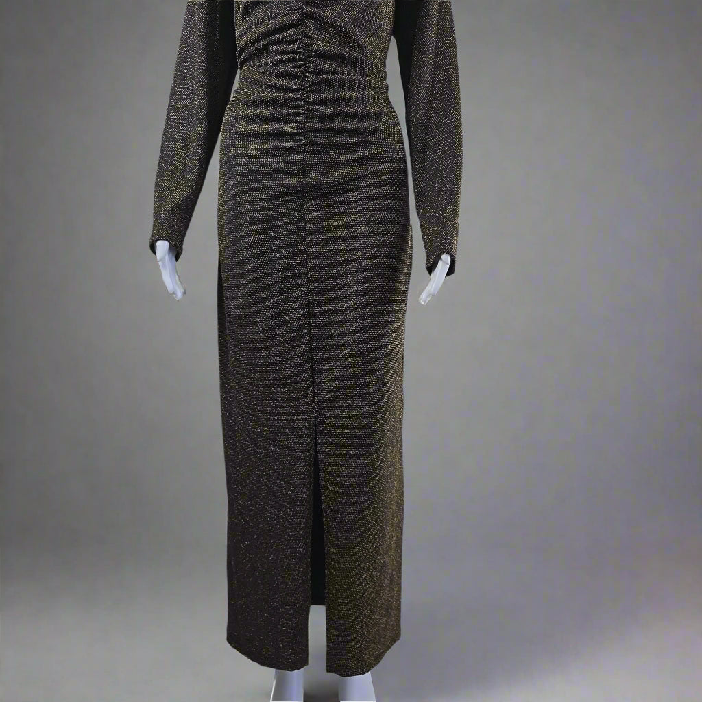 Black and gold textured dress on a mannequin against a light gray background