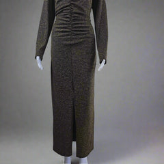 Black and gold textured dress on a mannequin against a light gray background