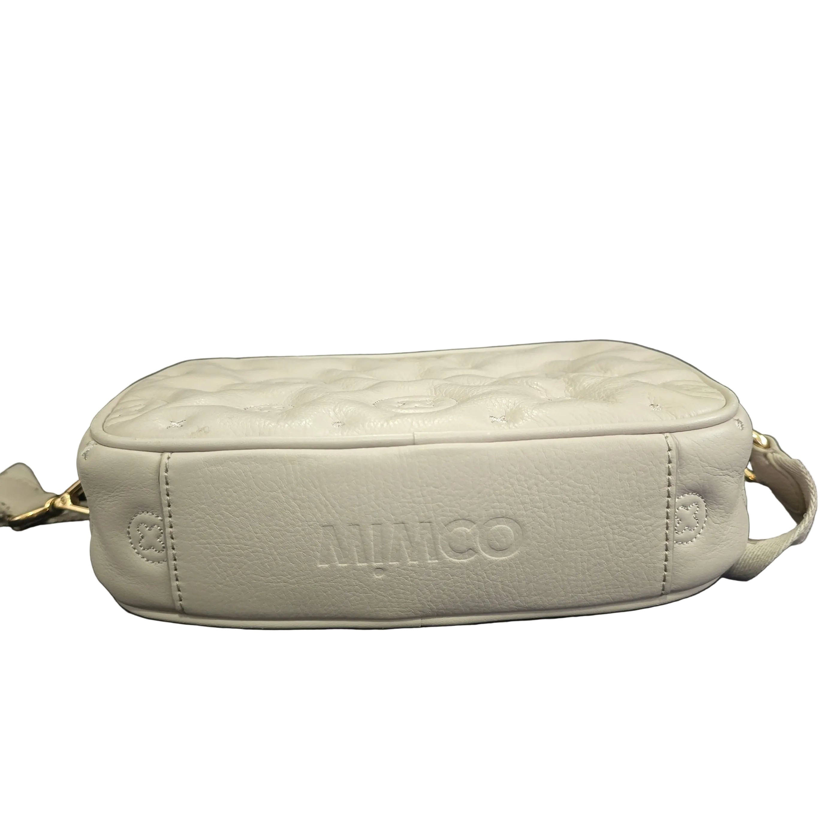 Grey shoulder bag with gold accents on a light background