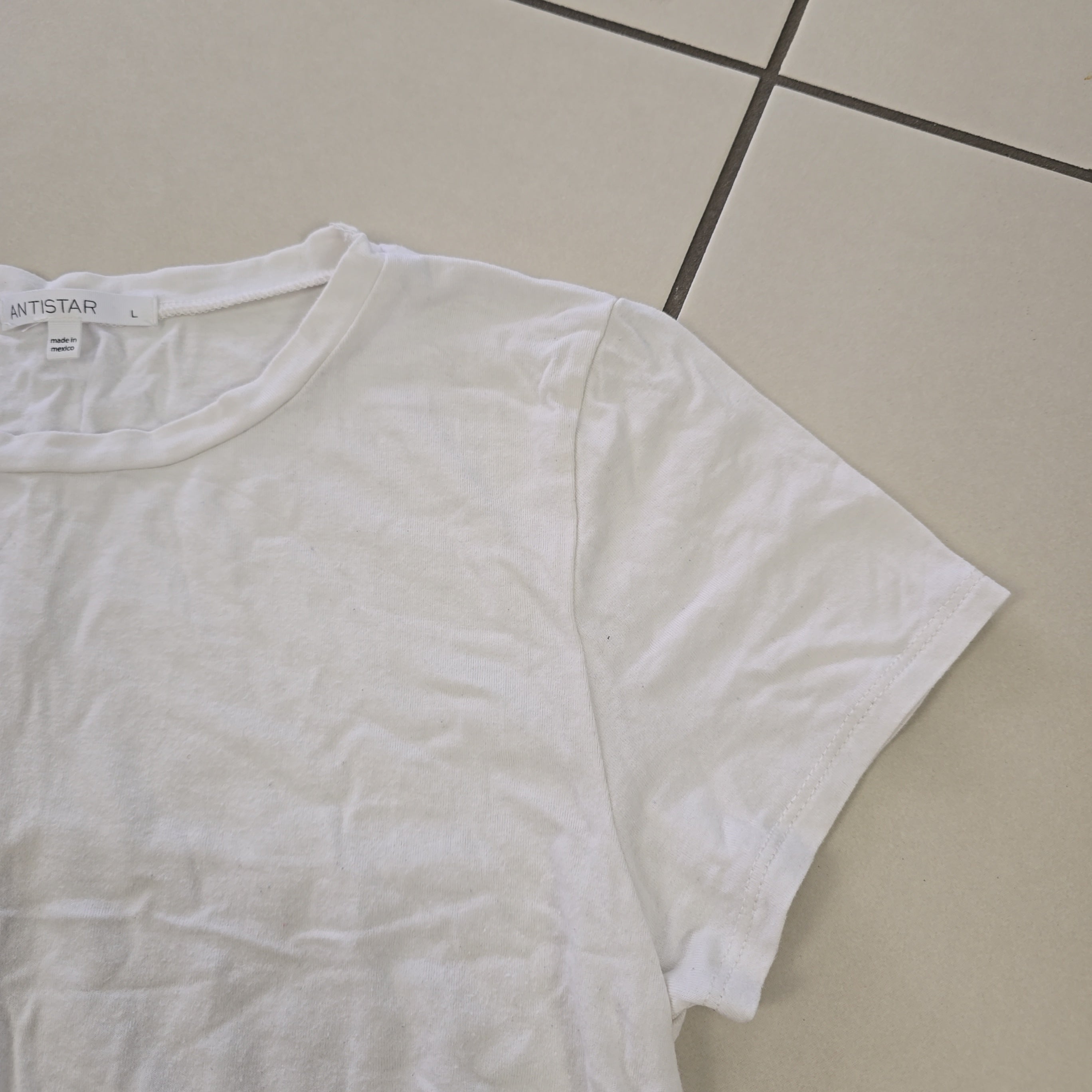 White tank top on a light background