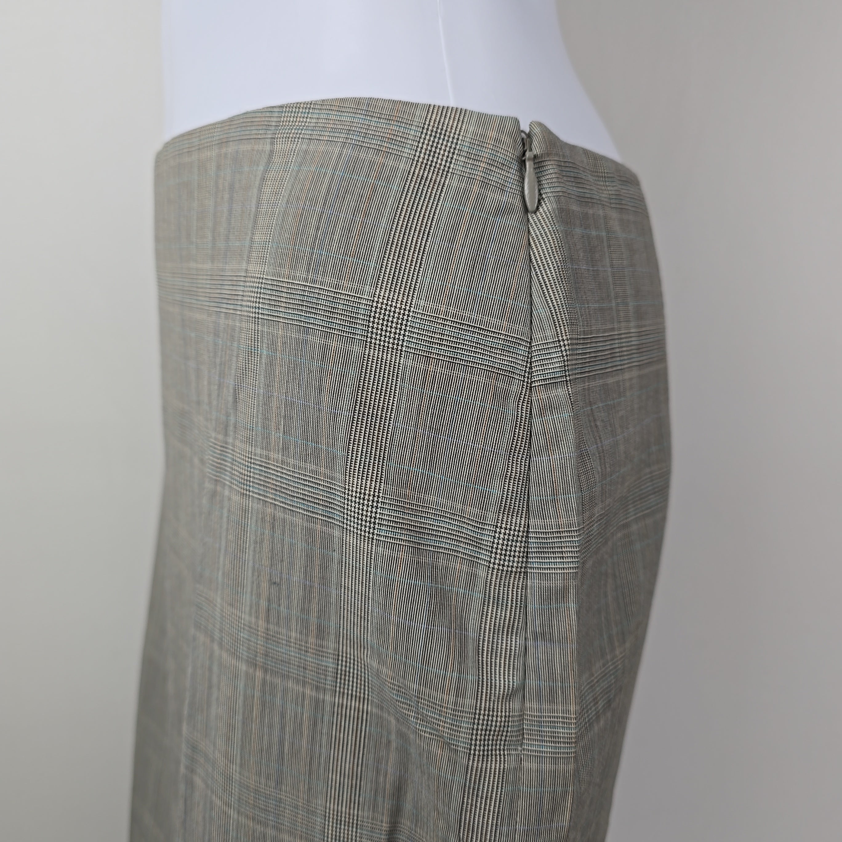 Gray checkered skirt on a white background