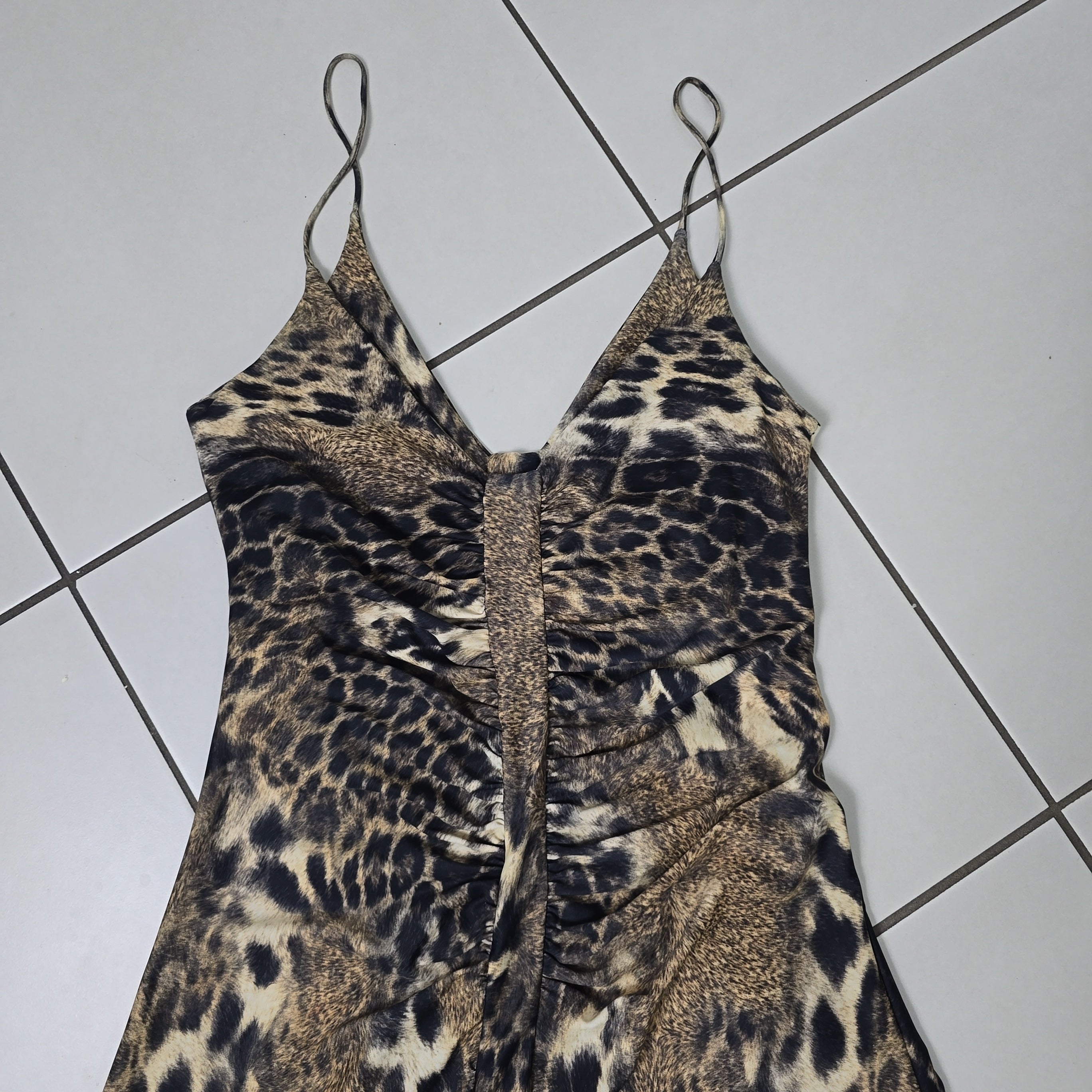 Leopard print dress on a light background