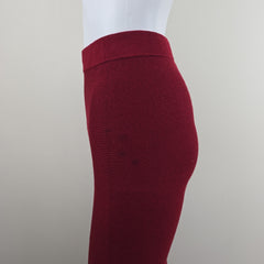 Close-up of a red skirt on a neutral background