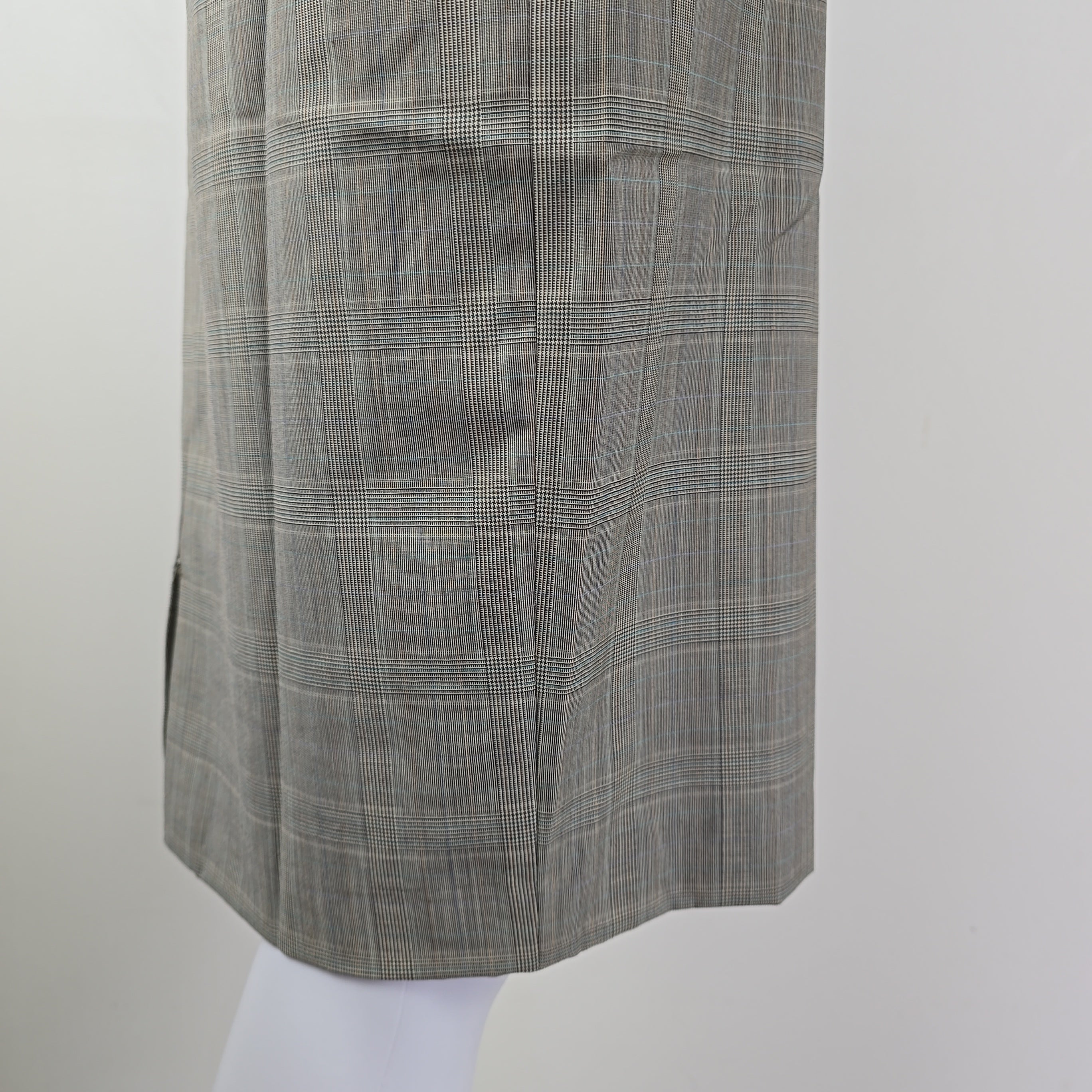 Gray checkered skirt on a white background