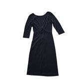 Black dress on a white light background