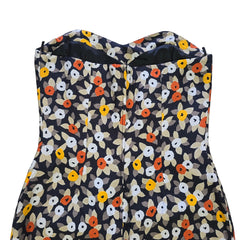 Floral-patterned strapless dress on a light background