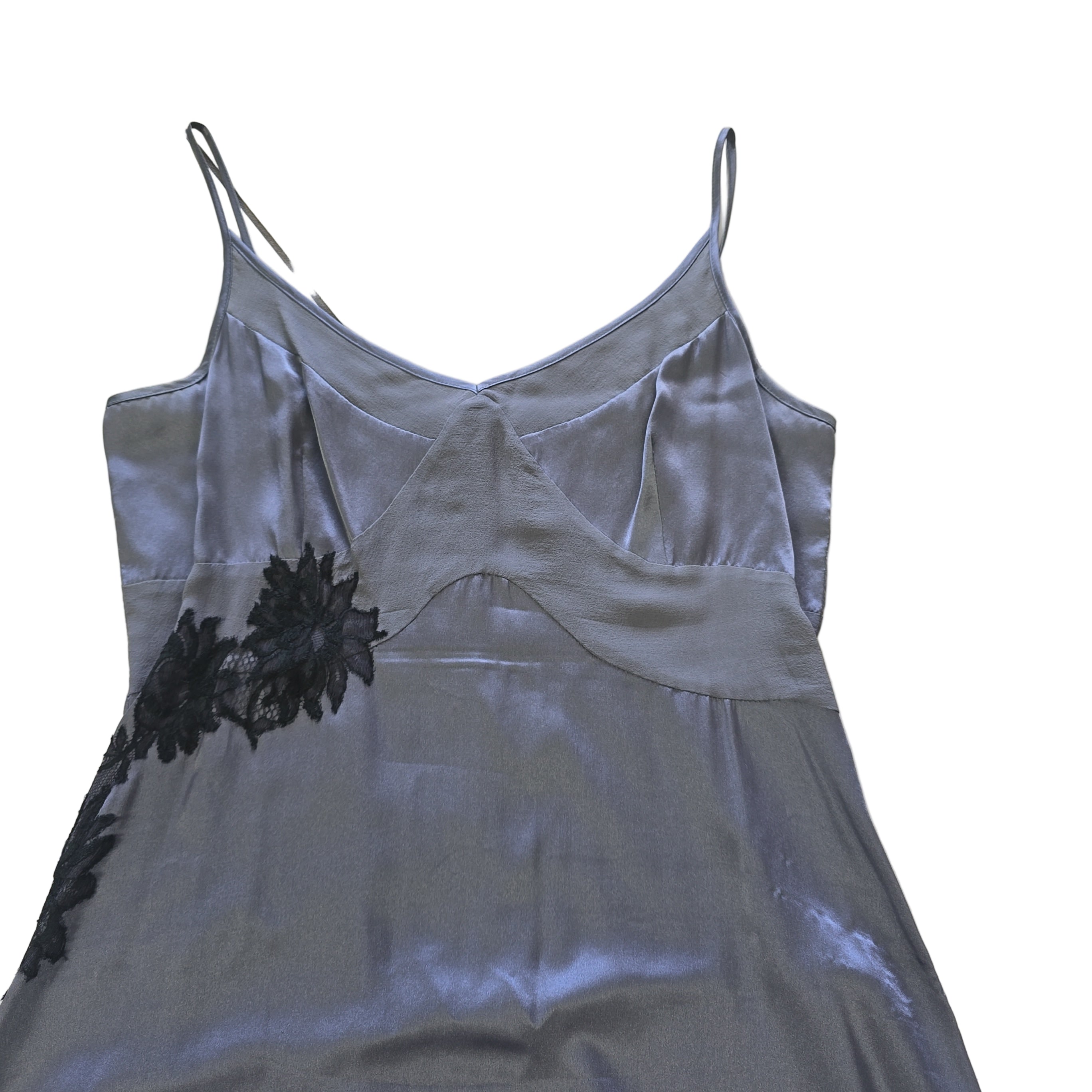 Grey dress with black floral patterns on a light background.