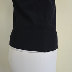 Black tank top on a light background