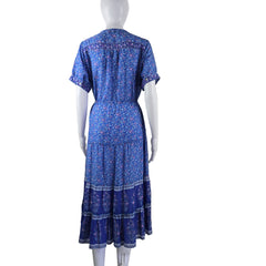 Blue patterned dress on a mannequin against a plain background